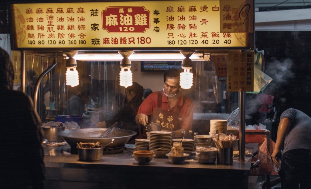 A man preparing food in Taiwan